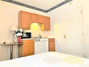 1 bedroom, desk, iron/ironing board, travel cot