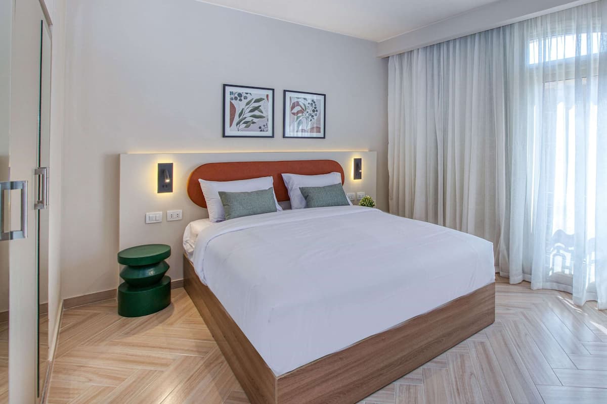 Standard Apartment, 1 Bedroom | 1 bedroom, in-room safe, blackout drapes, iron/ironing board