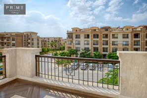 Family Duplex, 1 Bedroom | Minibar, in-room safe, blackout drapes, iron/ironing board - Prime Residence Kattameya (New Cairo)