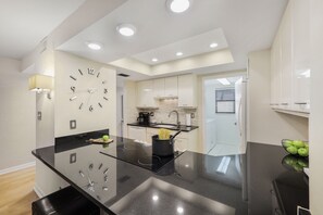 Fridge, microwave, oven, stovetop - Delightful south end condo w/ pool/steps to beach (Marco Island)