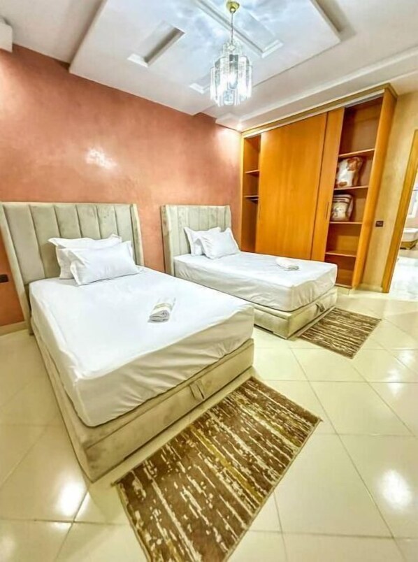 2 habitaciones y ropa de cama