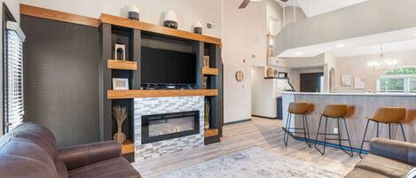 Télévision à écran plat de 50 pouces avec chaînes numériques, cheminée