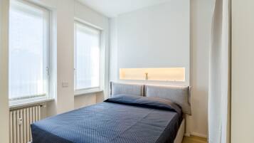 1 bedroom, desk, iron/ironing board, travel cot