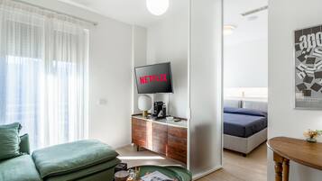 1 bedroom, desk, iron/ironing board, travel cot