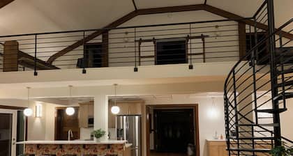 Stay in a remodeled church near ski hill, snowmobile trails and river to kayak!!