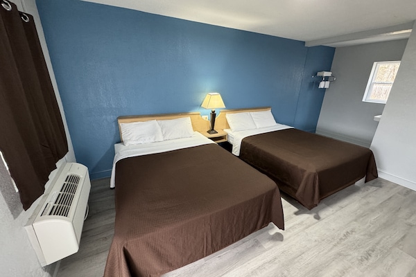 Room, 2 Queen Beds, Smoking, Garden View | WiFi (free), bed sheets