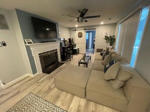 Smart TV, fireplace, DVD player, books