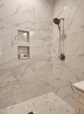 Jetted tub, hair dryer, towels, soap
