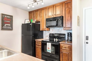 Condo, Multiple Beds, Patio (Cozy Condo at Rock Lane Resort) | Private kitchen