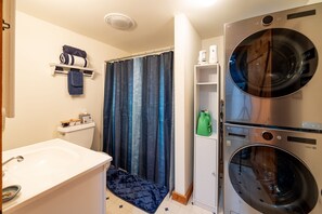 Hair dryer, towels, soap, shampoo