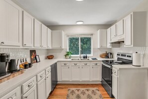 Fridge, microwave, oven, stovetop - Stylish 4 BR Beach Retreat - Steps to the Ocean ~ (St. Augustine)