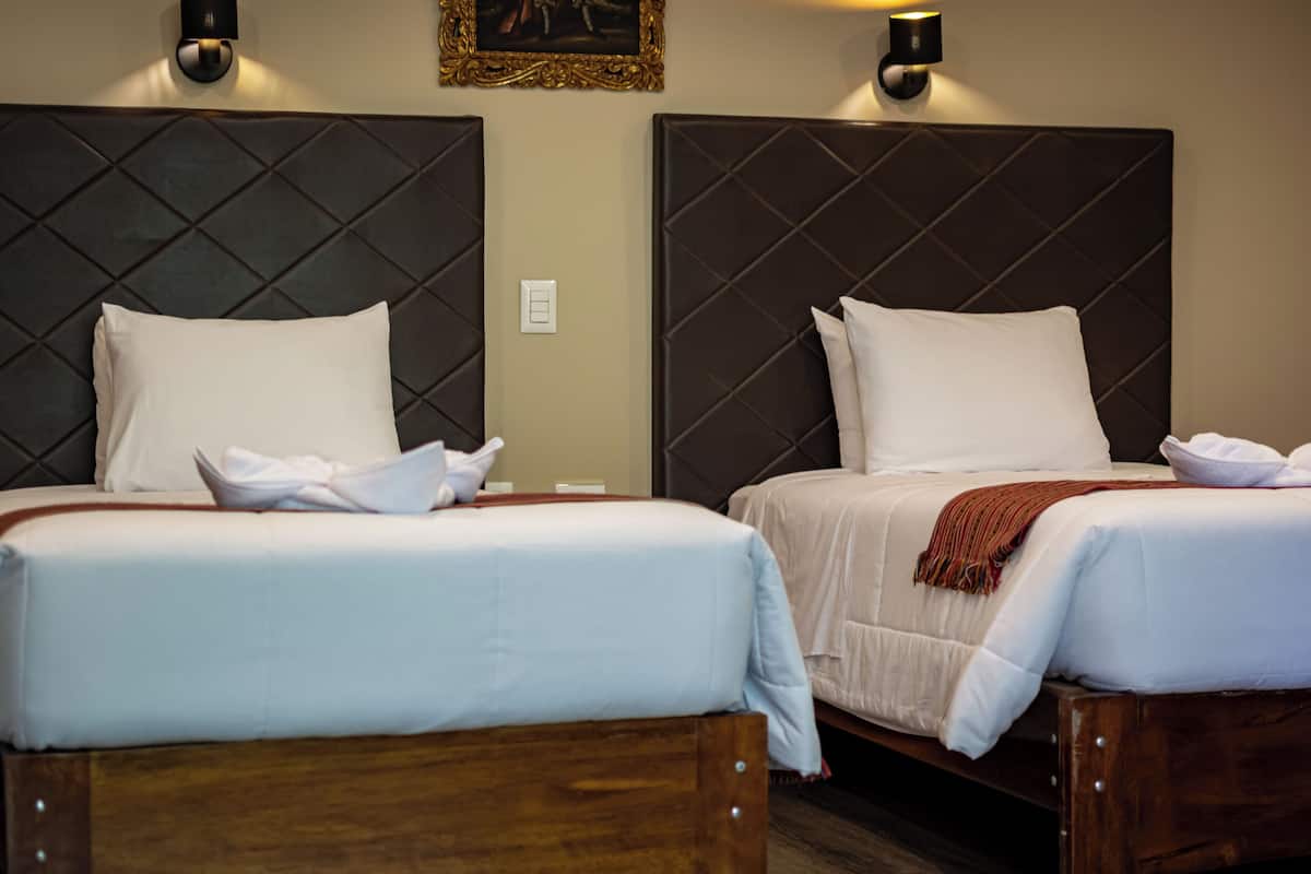 Chambre Quadruple Familiale | 1 chambre, coffres-forts dans les chambres, Wi-Fi gratuit, draps fournis