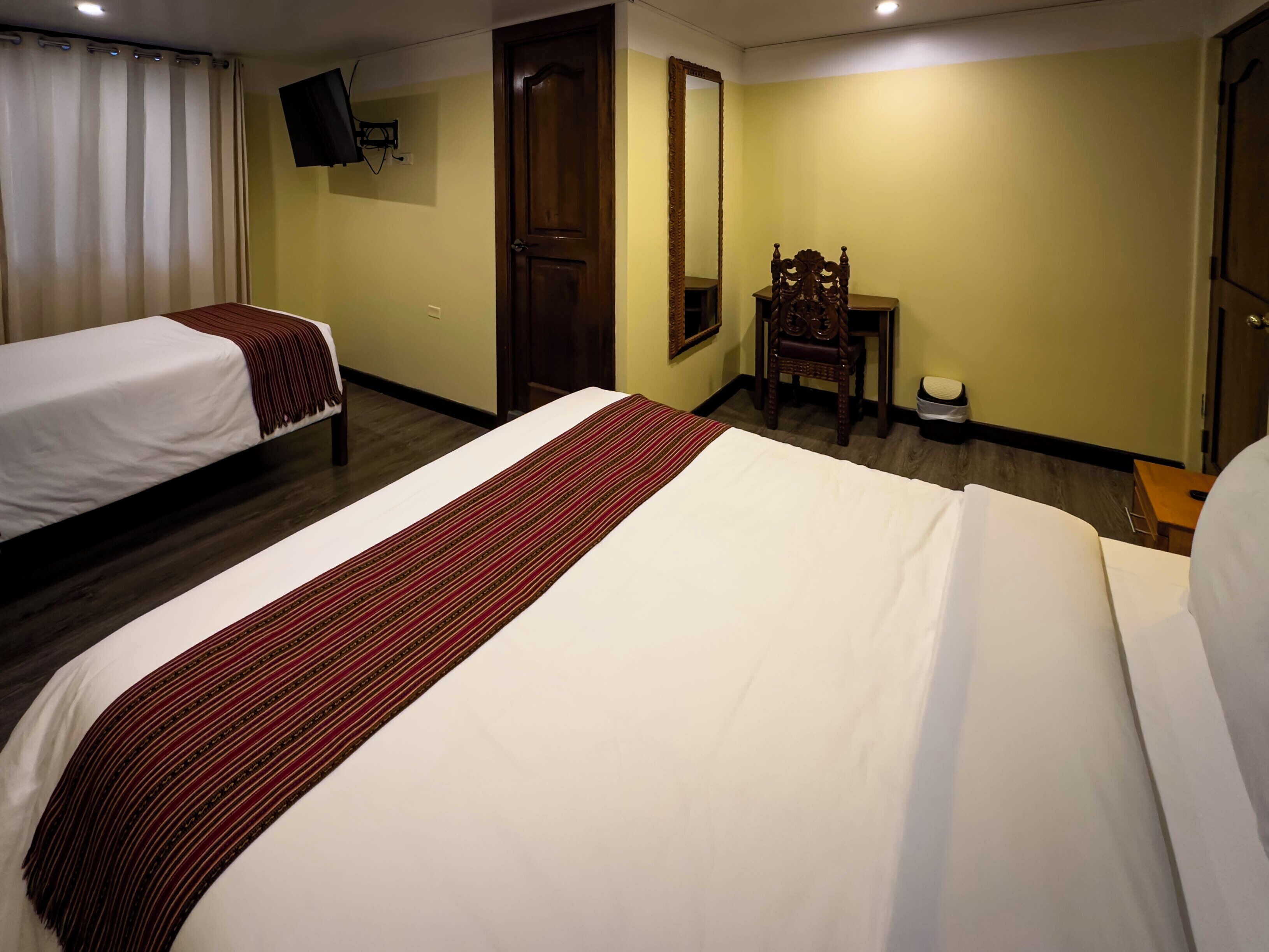 家庭三人房 | 房內夾萬、免費 Wi-Fi、床單