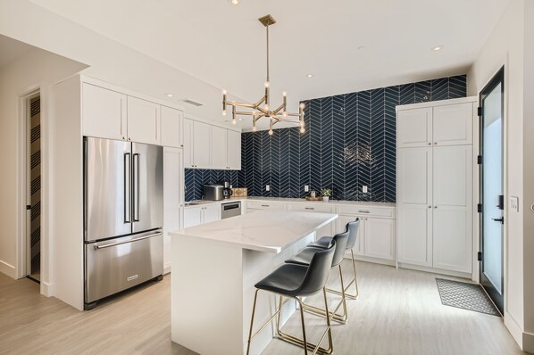 Fridge, dishwasher, coffee/tea maker, ice maker