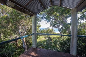 Terrace/patio - Surf Gums is a four bedroom, 2 bathroom home nestled in amongst native gum trees (Point Lookout)