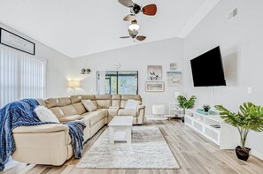 House, Multiple Beds, Patio, Garden View | Living area | TV - Blue Lagoon (Tampa)