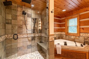Bathtub, towels, soap, shampoo