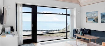Beachfront cottage with panoramic view