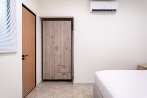 2 quartos, ferros/tábuas de passar roupa, Wi-Fi de cortesia