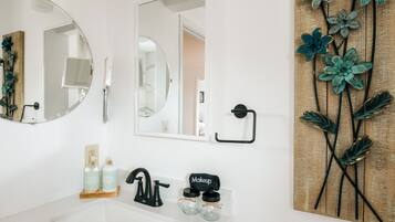 Hair dryer, towels, soap, toilet paper