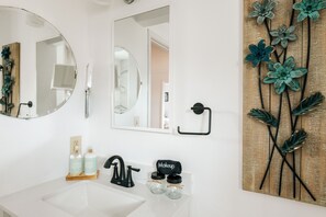 Hair dryer, towels, soap, toilet paper