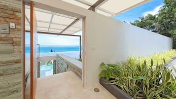 Enjoy ocean views from the spacious balcony through the large sliding glass door.