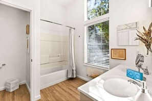 Shower, hair dryer, towels, shampoo