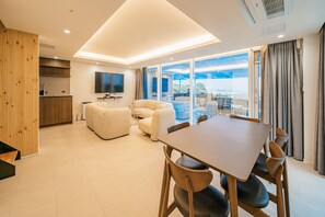 Pool Villa Town | Living area | Flat-screen TV, heated floors