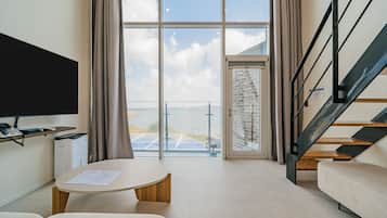 Duplex Haeilri Spa | Área de estar | TV de tela plana, pisos aquecidos