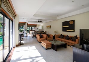 Villa, 4 Bedrooms | Living area | 50-inch Smart TV with cable channels
