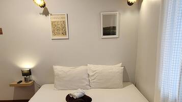 Laptop workspace, free WiFi, bed sheets