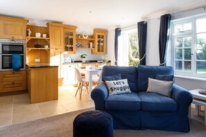 TV, fireplace, books, offices
