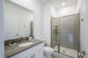 Bathtub, hair dryer, towels