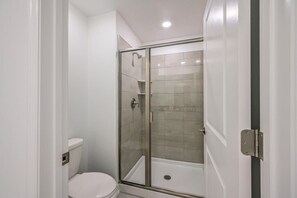 Bathtub, hair dryer, towels