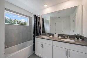 Bathtub, hair dryer, towels
