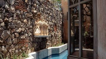 A rooftop pool, a heated pool