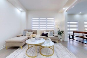 Deluxe House, 4 Bedrooms | Living area | Flat-screen TV, fireplace, streaming services