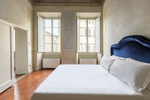 Apartamento, 1 quarto | Cofres nos quartos, berços grátis, Wi-Fi de cortesia, roupa de cama