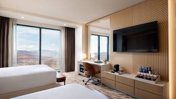 Premium bedding, down comforters, pillowtop beds, in-room safe