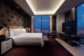 A hotel with a modern design, featuring a prominent