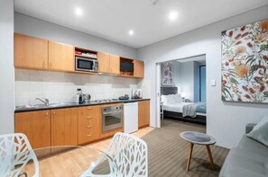 1 bedroom, desk, iron/ironing board, travel cot