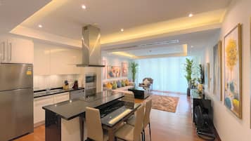 Apartemen Deluks, 2 kamar tidur, pemandangan kebun | Area keluarga