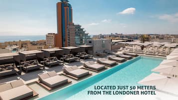 Seasonal outdoor pool, pool umbrellas, pool loungers