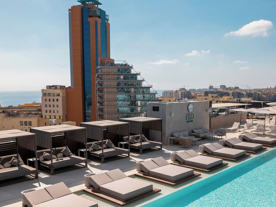 Seasonal outdoor pool, pool umbrellas, pool loungers