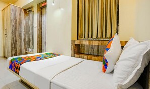 Egyptian cotton sheets, premium bedding, in-room safe, free WiFi - Fabhotel Happy Stay (Pune)