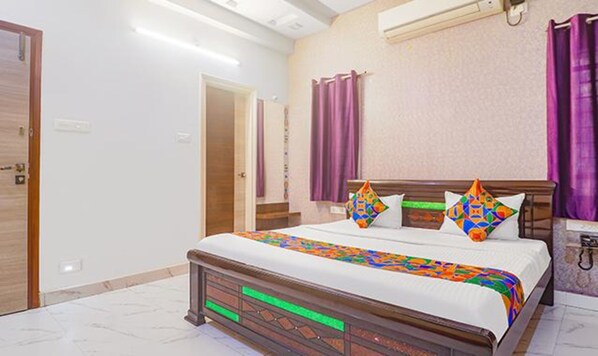 华丽客房 | 埃及棉床单、高档床上用品、客房内保险箱、免费 WiFi