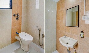 Habitació Deluxe | Bany | Dutxa, capçal de dutxa tipus cascada i articles de tocador gratuïts 