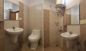 Deluxe Room | Bathroom | Shower, rainfall showerhead, free toiletries, towels