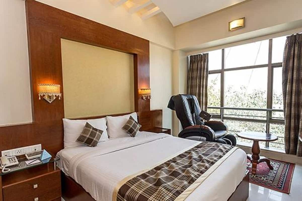 Premium kamer | Lakens van Egyptisch katoen, luxe beddengoed, een kluis op de kamer