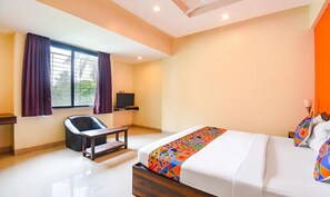 Egyptian cotton sheets, premium bedding, in-room safe, free WiFi - Fabhotel Envirosafe Stays (Pune)